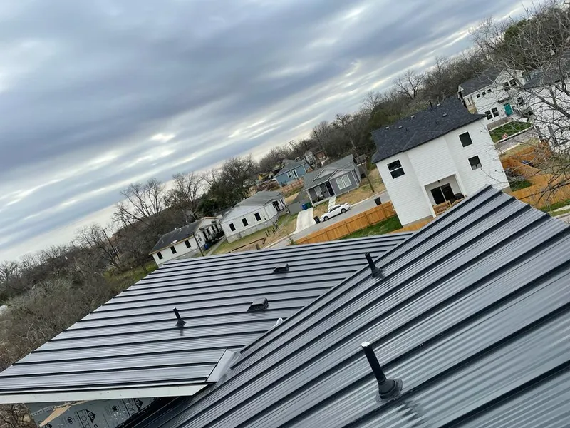Standing seam metal roof panels with vents for Skylight Repair in Lubbock